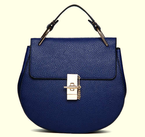New fashion beautiful design lovely handbag, with key and chains. Blue color. Stock in ZA