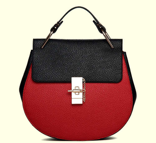 New fashion beautiful design lovely handbag, with key and chains. Maroon matches black. Stock in ZA