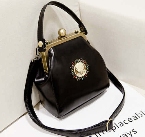 Vintage England style lesure handbag, with strape. Black color. Stock in ZA