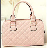 Lattice pattern ladies handbag. with a strape. Pink color. Stock in ZA