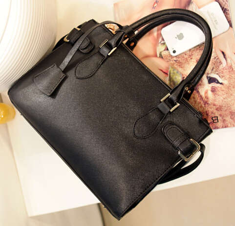 Office lady loves wild match handbag. Black color. Stock in ZA