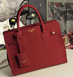 Nubuck leather ladies handbag with strape. maroon color. Stock in ZA