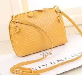 Simply design leisure shoulder bag. Yellow color. Stock in ZA