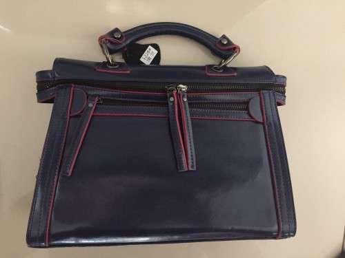 Classic genuine leather motor bag. Dark Blue matched rose edge. Stock in ZA