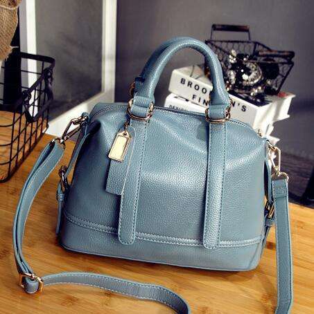 Wild matches fashion elegant leisure bag with strap. Blue color. Stock in ZA