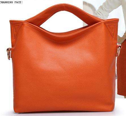Modern design lady hand bag with strap. Orange color. Stock in ZA.
