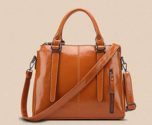 Noble style office lady handbag with strape. Brown color. Stock in ZA.