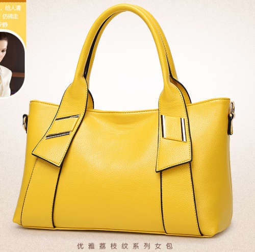 Litchi pattern lady handbag. Yellow color. Stock in ZA.