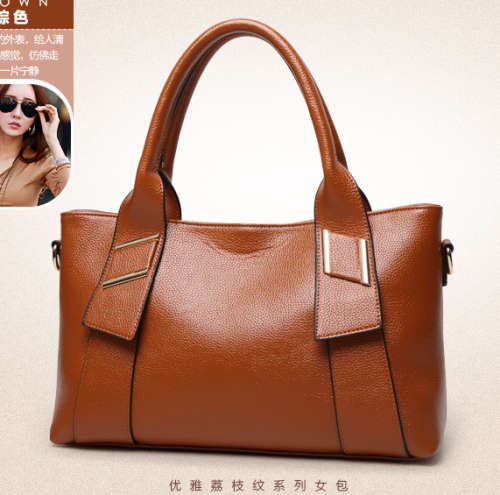 Litchi pattern lady handbag. Brown color. Stock in ZA.