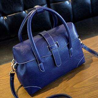 Wild match fashion handbag with cap. Good quality. Blue color. Stock in ZA