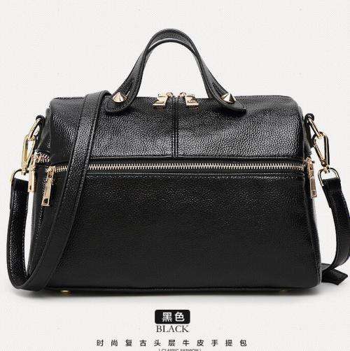 Boston pillow style fashion handbag with strap. Black color. Stock in ZA