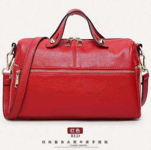 Boston pillow style fashion handbag with strap. Red color. Stock in ZA