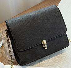 Retro beautiful leather pattern ladies handbag with a chain. Black color. Stock in ZA