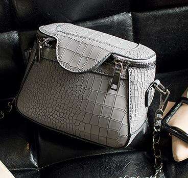 Crocodile embossed strong leather bucket handbag. Grey color. Stock in ZA