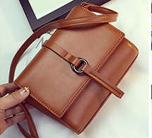 Simple design small shoulder bag. Brown Color. Stock in ZA.