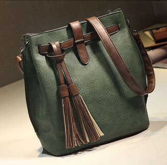 Fashion bucket ladies bag with tassels. Green color. Stock in ZA.