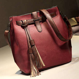 Fashion bucket ladies bag with tassels. Red color. Stock in ZA.