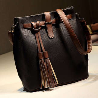 Fashion bucket ladies bag with tassels. Black color. Stock in ZA.
