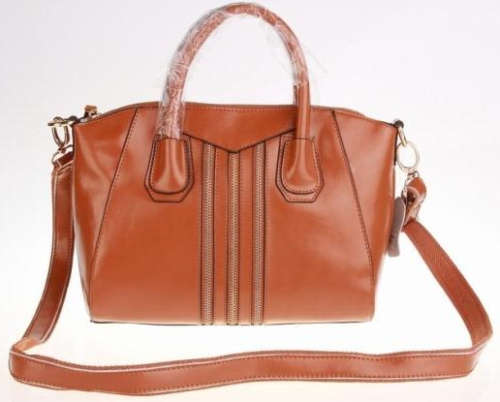 Genuine leather retro lady handbag. Brown color. Stock in ZA.