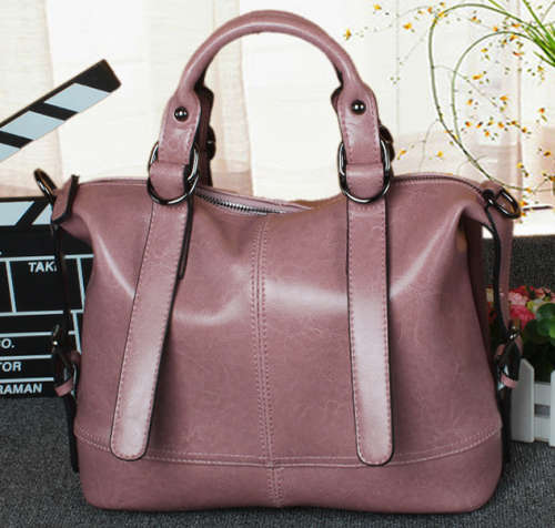 Genuine leather big capacity ladies handbag.Purple pink color.Delivery only start 5 Sep 2017