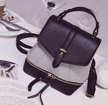 Multifunction mini backpack. Grey color. Stock in ZA.