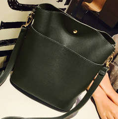 Simply design lady bag. Green color. Stock in ZA.