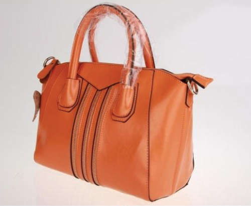 Genuine leather retro lady handbag. second layer cow leather. orange color. Stock in ZA.