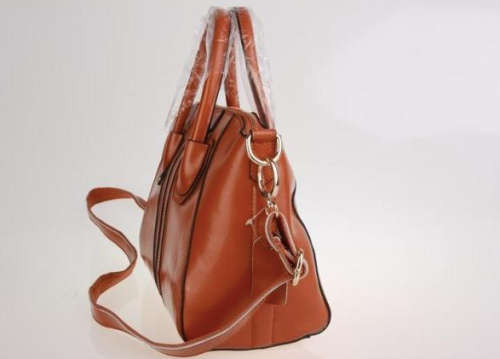 Genuine leather retro lady handbag. second layer cow leather. orange color. Stock in ZA.