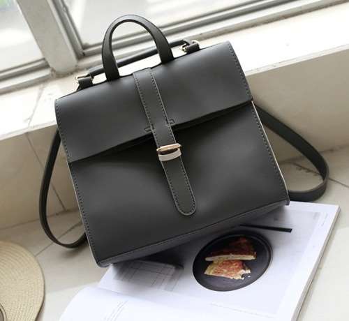 Simply design all-match lady bag. Grey color. Stock in ZA.