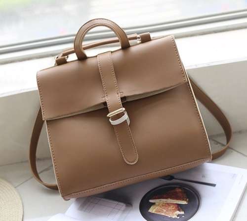 Simply design all-match lady bag. Grey color. Stock in ZA.