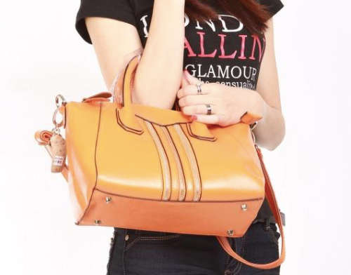 Genuine leather retro lady handbag. second layer cow leather. orange color. Clearance price.