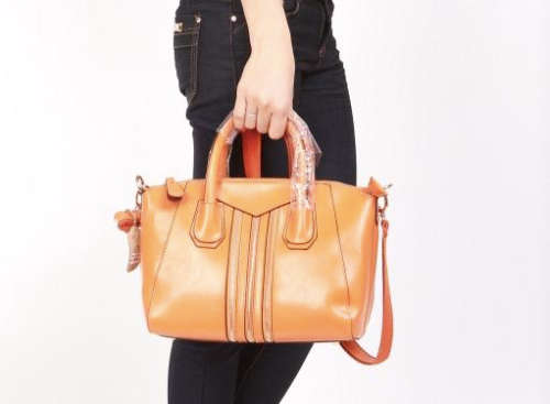 Genuine leather retro lady handbag. second layer cow leather. orange color. Clearance price.