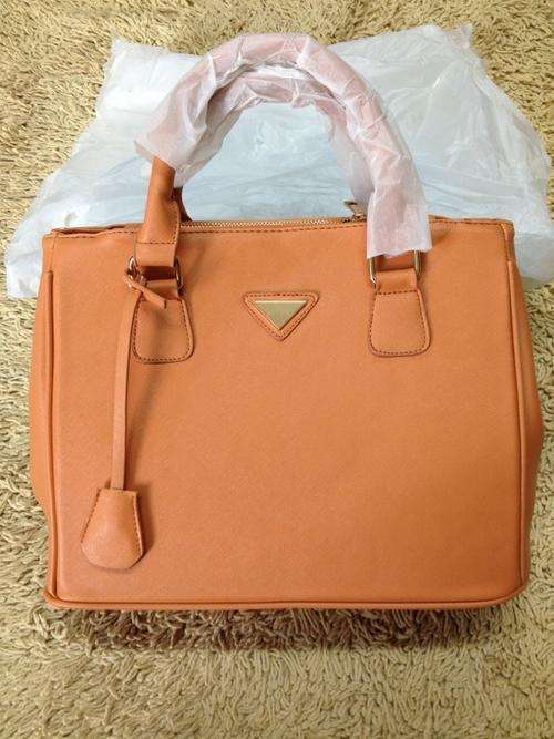 Big name style OL wild matches bag. khaki orange color. Shipping R30