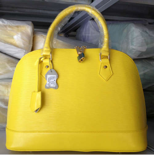 Genuine leather shell style famous design ladies bag. XL size. Yellow color.