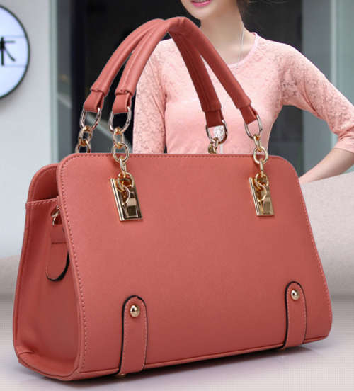 Beautiful multi-fuction ladies handbag. Dark pink color. Shipping R30