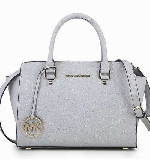 Genuine leather lady bag. Medium size. Silver color. Stock in ZA