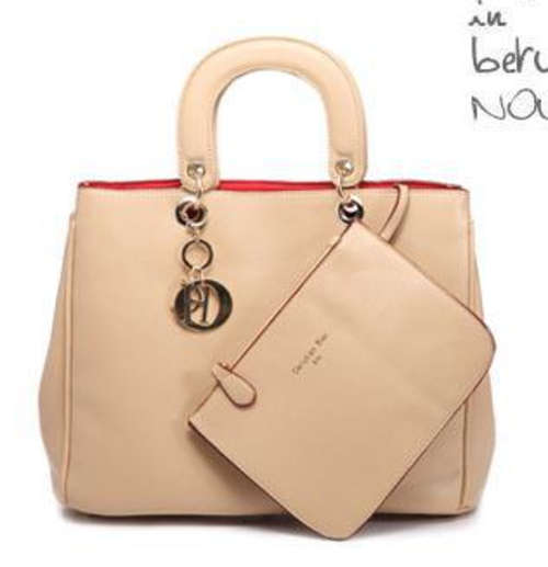 Famous design elegant wild match ladies handbag, with belt. Stock in ZA