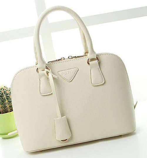 L brand famous shell design high quality ladies handbag. white color. Stock in ZA