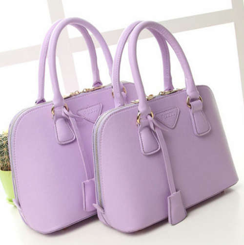 L brand famous shell design high quality ladies handbag. smaller size. Purple color. Stock in ZA