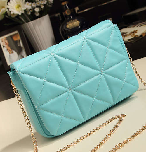 Fashion chain ladies shoulder handbag. Blue color. Stock in ZA