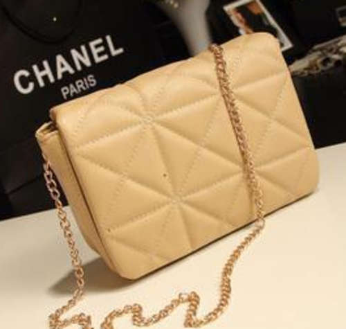 Fashion chain ladies shoulder handbag. Apricot color. Stock in ZA