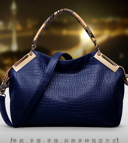 Retro snake pattern ladies handbag. with belt. Royal blue. Stock in ZA