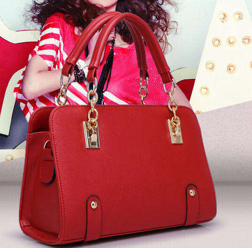 Beautiful high qualtiy medium size ladies handbag. Red color. Stock in ZA