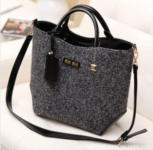 Woolen skin bucket design ladies fashion handbag. In my own stock
