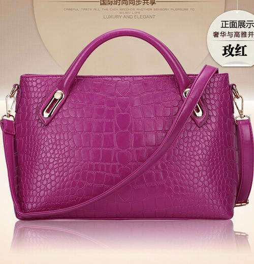 Crocodile pattern wild use ladies handbag with strape. Rose color. In my own stock