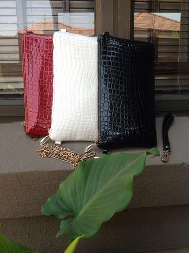 Low price promotion clutches. Color black, white, red. With chains and handle.