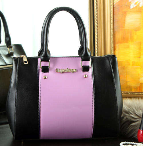 Classic colors joint office ladies handbag with strape. Black matches purple. Stock in ZA