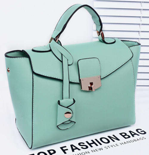 Retro taiga hasp ladies handbag with strape. Water blue color. Stock in ZA