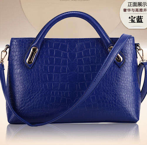 Crocodile pattern wild use ladies handbag with strape. Blue color. In my own stock
