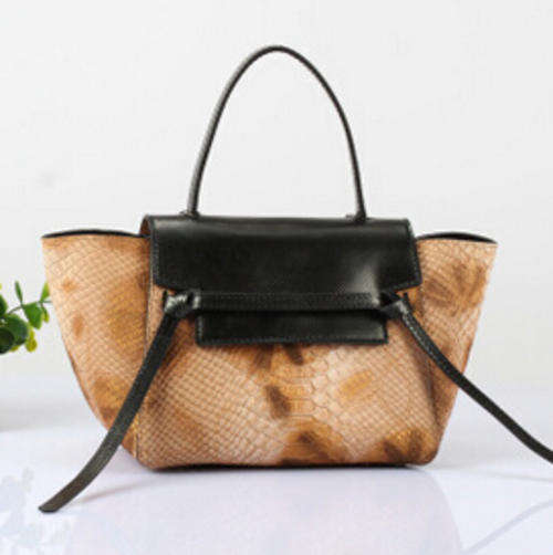 Genuine leather catfish style handbag,amazing quality.Brown color.